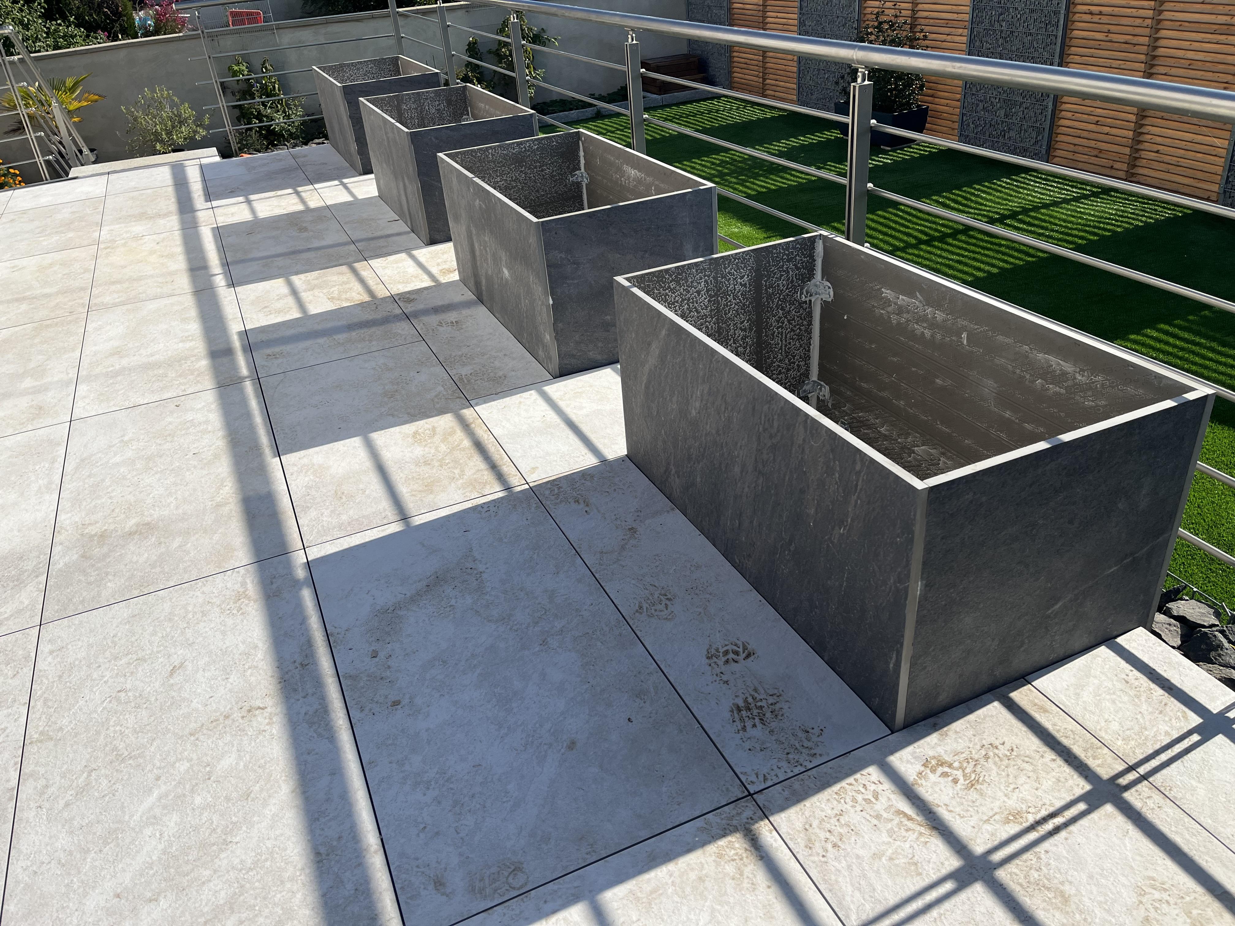 Construction de terrasse en dalle avec carré potagé en beton à Haguenau par TP Ruhland